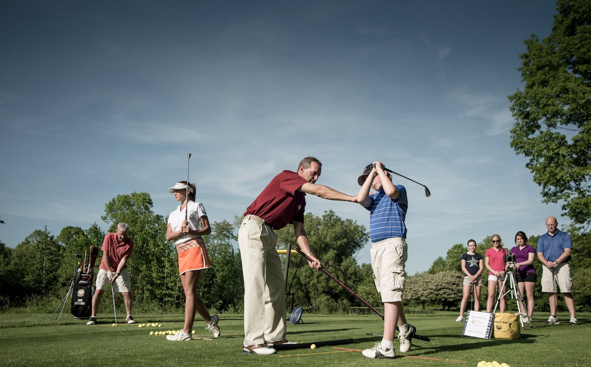 Group golf lesson with friends and family